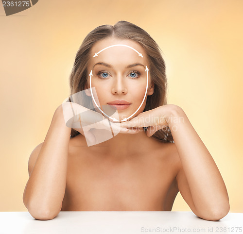 Image of face and hands of beautiful woman