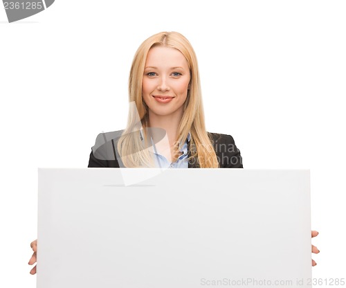 Image of businesswoman with white blank board