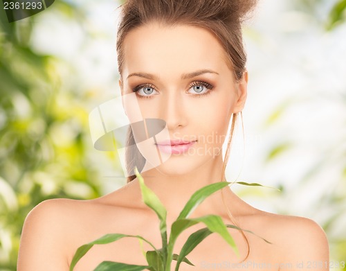 Image of woman with sprout