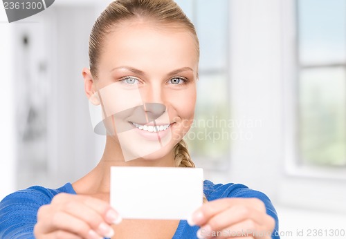 Image of happy woman with business card