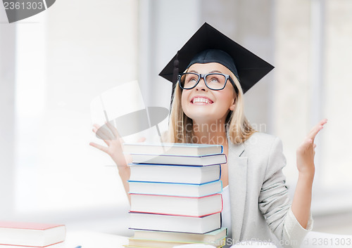 Image of happy student in graduation cap