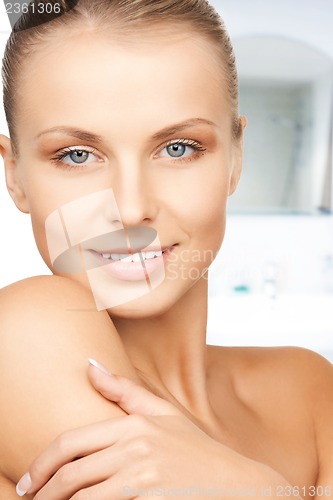 Image of face and hands of beautiful woman