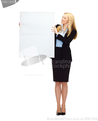 Image of businesswoman with white blank board