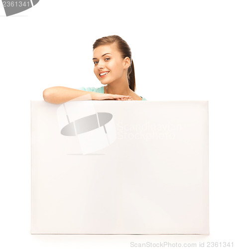 Image of woman with white blank board