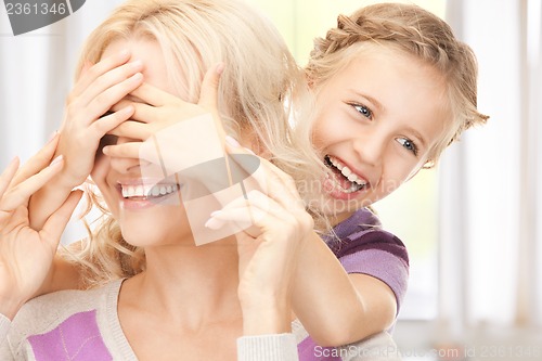 Image of happy mother and little girl