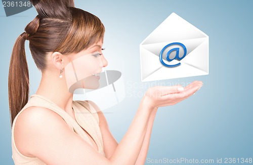 Image of woman showing virtual envelope