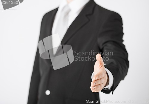 Image of businessman with open hand