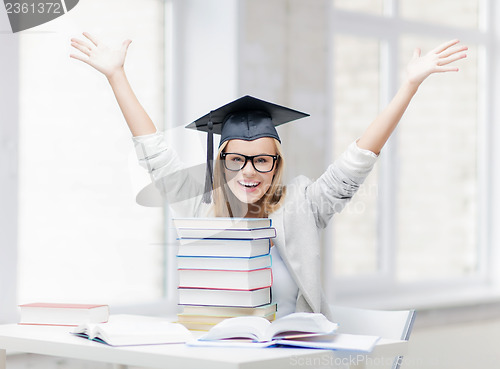 Image of happy student in graduation cap