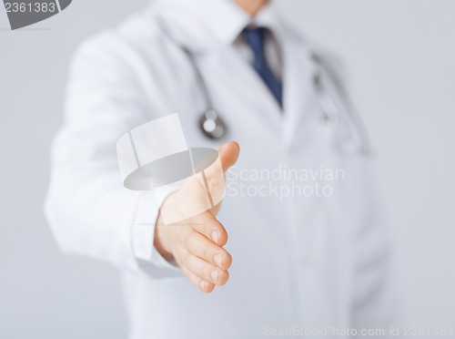 Image of male doctor with open hand ready for hugging