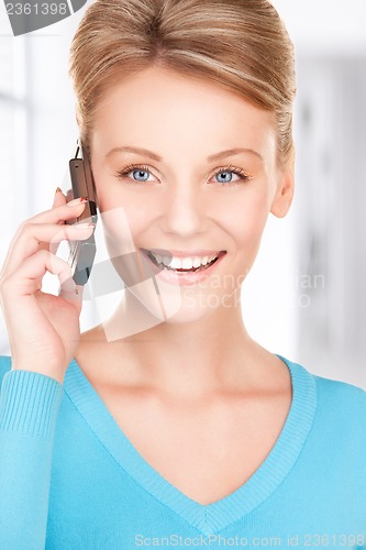Image of happy businesswoman with phone