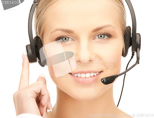 Image of friendly female helpline operator