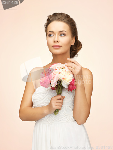 Image of woman with bouquet of flowers