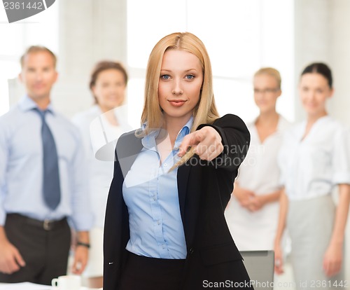 Image of businesswoman pointing her finger