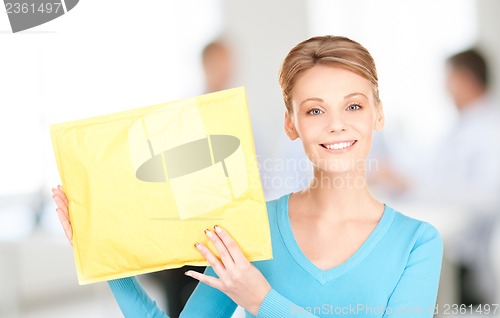 Image of businesswoman with parcel
