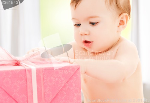 Image of happy child with gift box