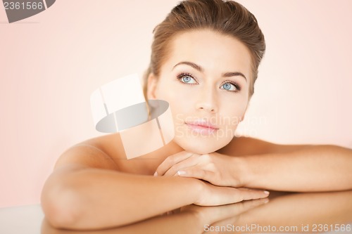 Image of woman with mirror