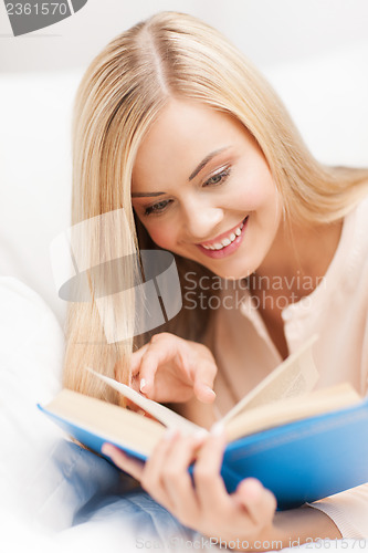 Image of woman reading book