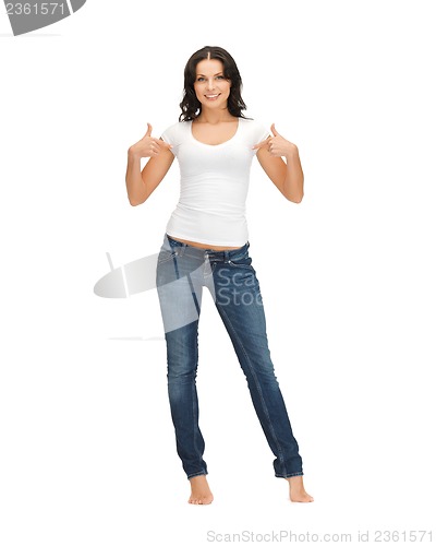 Image of woman in blank white t-shirt pointing at herself