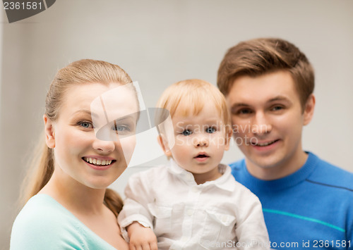 Image of happy family with adorable baby