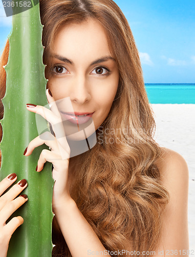 Image of lovely woman with aloe vera