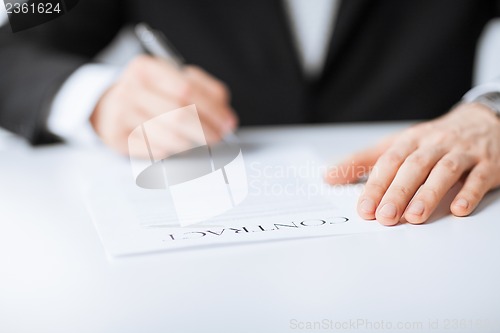 Image of man with contract