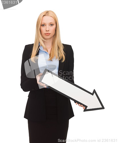 Image of smiling businesswoman with direction arrow sign