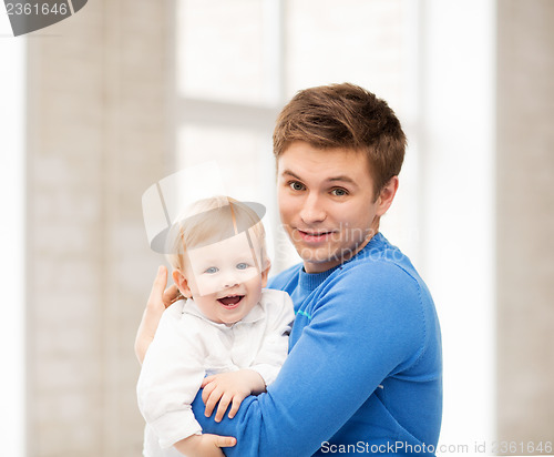 Image of happy father with adorable baby