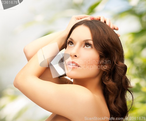 Image of woman with curly hair