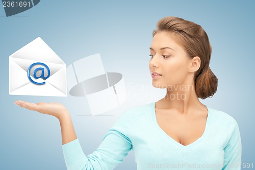 Image of woman showing virtual envelope