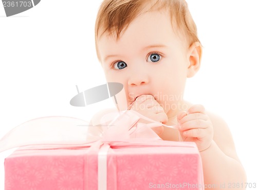 Image of happy child with gift box