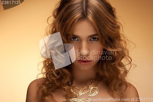 Image of woman with long curly hair