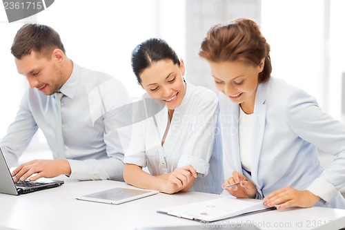 Image of business team working in office