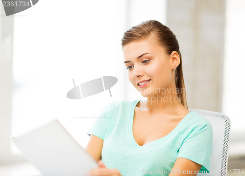 Image of smiling student girl with tablet pc