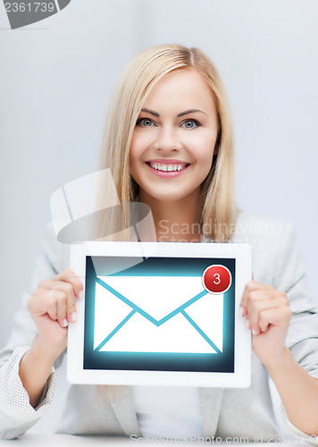 Image of woman holding tablet pc with email sign