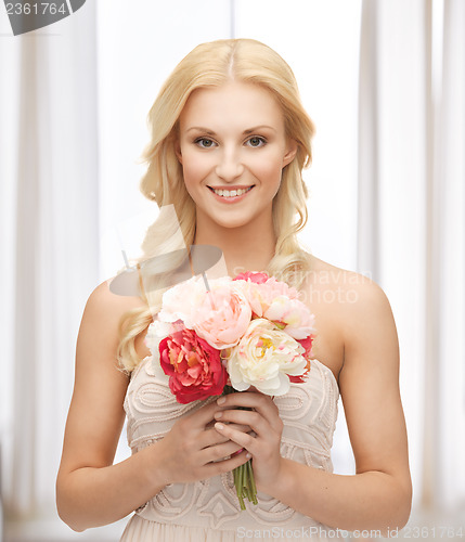 Image of woman with bouquet of flowers