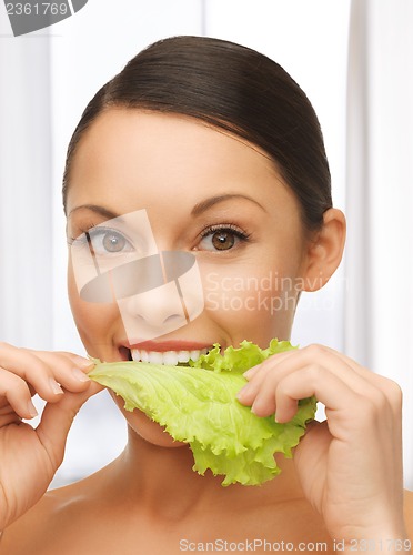 Image of woman with lettuce