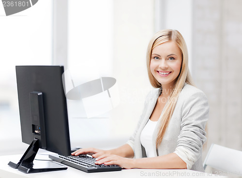 Image of businesswoman with computer