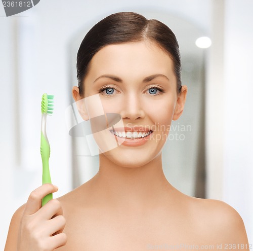 Image of woman with toothbrush