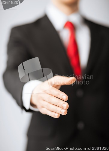 Image of businessman with open hand