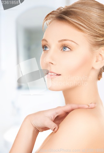 Image of face and hands of beautiful woman