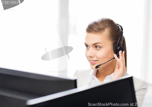 Image of friendly female helpline operator