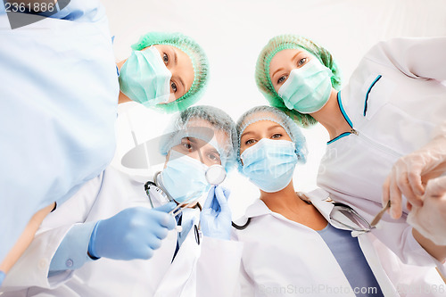 Image of group of doctors in operating room