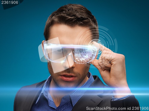 Image of businessman with digital glasses