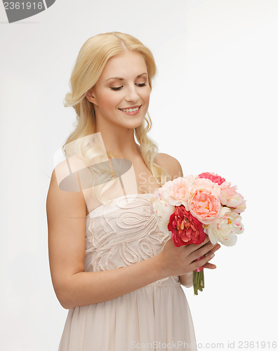 Image of woman with bouquet of flowers