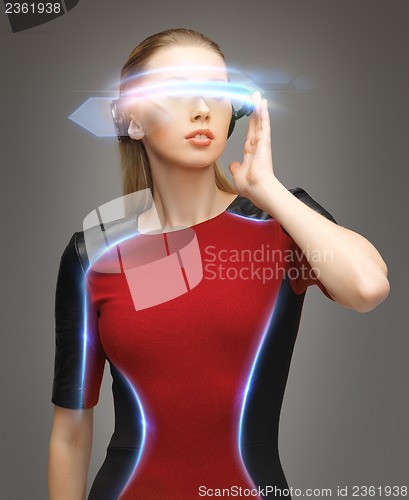 Image of attractive woman with digital glasses