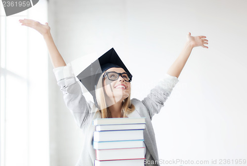 Image of happy student in graduation cap