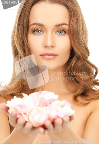 Image of woman with rose petals