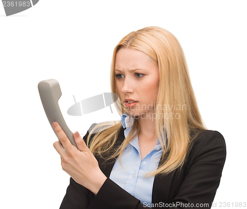 Image of picture of confused woman with phone