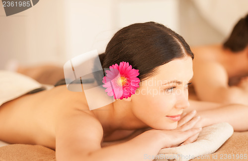 Image of woman in spa with hot stones