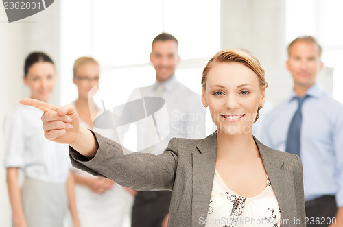 Image of businesswoman pointing her finger